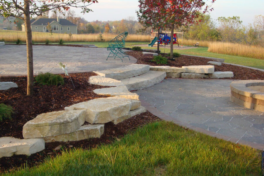 Multi-level Patio with Natural Outcropping and Radius Steps