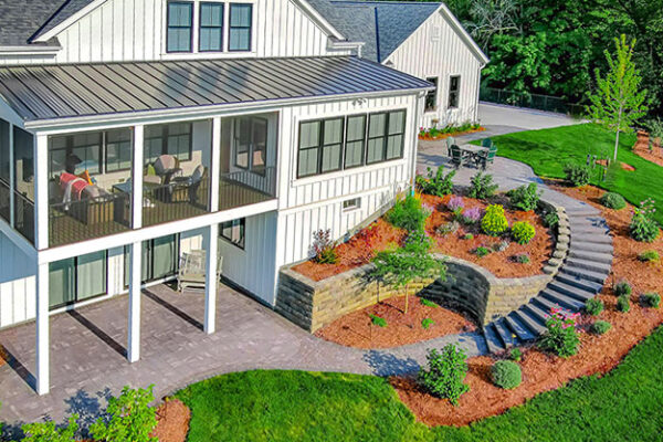 Curved Stairway Connects Layered Landscape